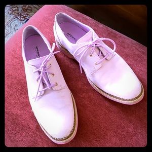 Pink Sperry lace up shoes.